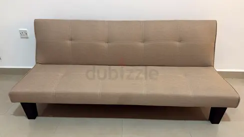 Simple beige fabric sofa bed - excellent condition