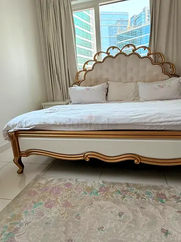 Queen-sized ornate tufted bed with gold trim - excellent condition all is 2250