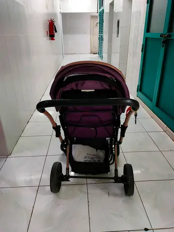Used purple baby stroller / pram - good condition