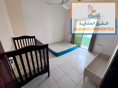 One bedroom and living room - spacious - brightly lit apartment - balcony - central air conditioning and cooling system - prime location with 24/7 ser