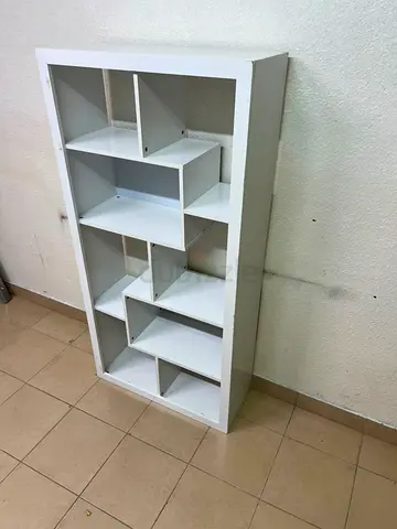 White multi-compartment shelving unit / bookcase - good condition