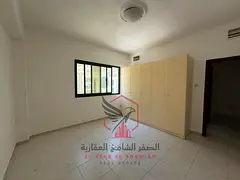 Largest two-bedroom apartment with a living room, large hallway, built-in wardrobes, free gym, close