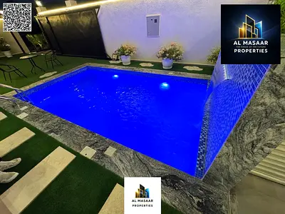Luxury villa with swimming pool in Al Amerah area, Ajman. Price includes electricity, water, and ai