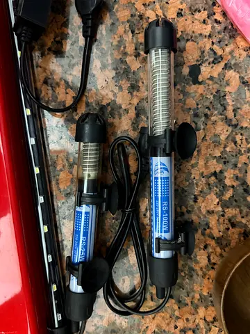 Two aquarium heaters (RS-100W & RS-65W) in working condition and Two lights (40 &50cm)