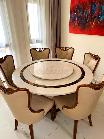 Cream marble-top round dining table with 6 upholstered chairs (set)
