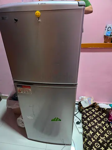Silver 2-door refrigerator, good working condition