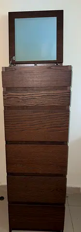 IKEA Malm 6-drawer chest with a fold-up mirror in a dark brown wood veneer finish