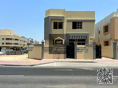Corner Dual-Use Residential & Commercial Villa on Main Road for Sale in Al Rawda 3, Ajman – Freeho