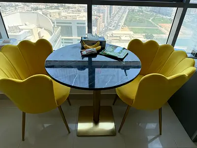 Exclusive Round Marble Top Coffee Table with 2 Yellow Velvet Shell Chairs & Brass base