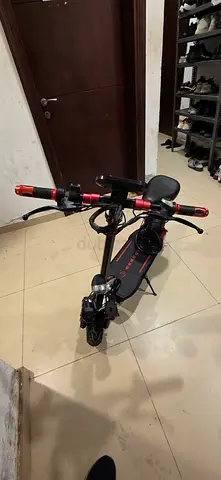 Electric Scooter with Red Accents