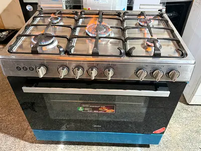 Used 5-Burner Gas Cooker with Built-in Oven - Stainless Steel