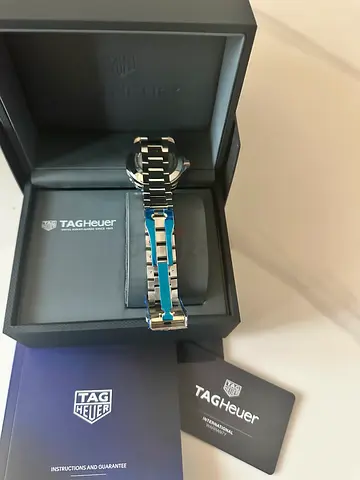 TAG Heuer men's stainless steel watch with box and papers