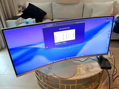 Samsung 34-inch ultra-wide curved QLED monitor featuring a 21:9 aspect ratio, a sharp 3440 x 1440 Ul