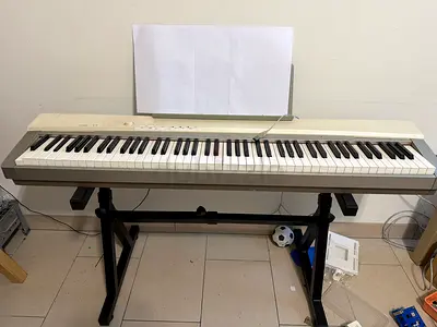 Yamaha Portable Digital Piano - 88 Keys, Stand Included. The leftmost 2 keys don't work.