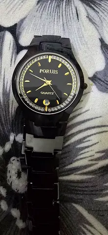 Black Poruis Quartz Women's & mens Watch with Crystal Bezel ceramic - Good Condition