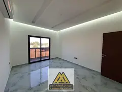 A spacious family villa with comfortable areas, a majlis, a lounge, and a rooftop terrace, featuring