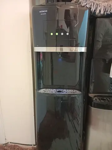 Black freestanding water cooler / water dispenser - working condition