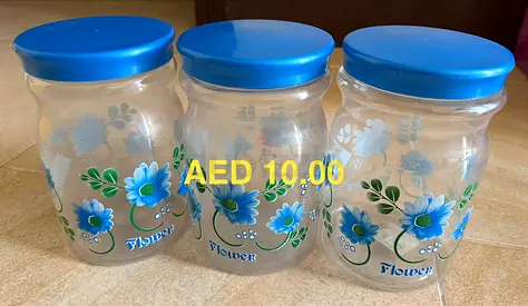 Set of 4 Glass Kitchen Storage Jars with Blue Lids - Floral Design
