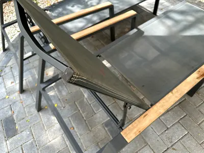 Outdoor metal and teak armchairs — set of 2, good condition