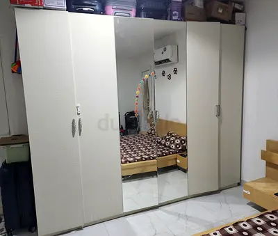 Urgent selling Large 6 Door Wardrobe with Mirrored Center Panels