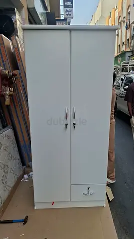 I'm selling brand new 2 door cabinet