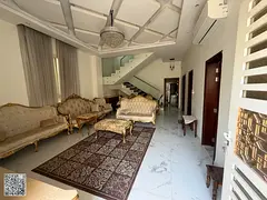 A fully furnished luxury villa for rent in Al Yasmin - Ajman, with high-end finishing and a distinc