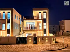 Luxury corner villa for sale in Al Bahia, comprising 3 floors, with a private pool and 5 master bedr
