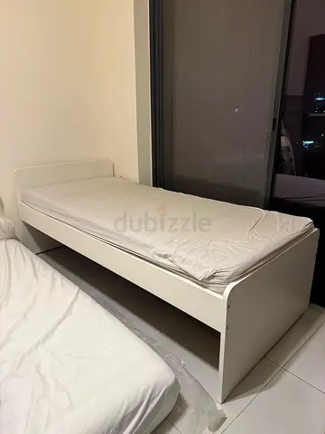 IKEA single bed with its IKEA SPRING MATTRESS