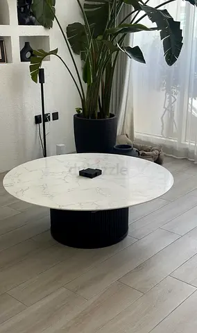 Round Marble-Top Coffee Table with Black Ribbed Base