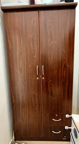 Two-door wooden wardrobe with drawers - good condition WxDxH = 90x50x190. Should be gone before 22nd