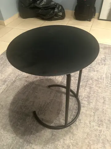 Black round metal side table - small occasional table