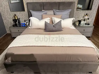 Queen upholstered bed frame with padded headboard in grey velvet