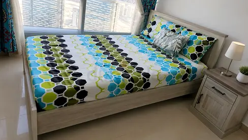 queen bed  with new mattress and bedside table - very good condition