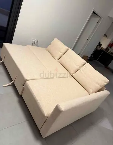 Beige Foldable Sofa Bed with Three Cushions