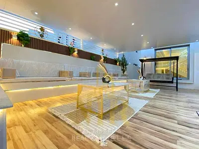 Classic two-story villas with a roof terrace, 5000 sq ft, available on Sheikh Ammar Main Street, price includes central air conditioning, freehold own
