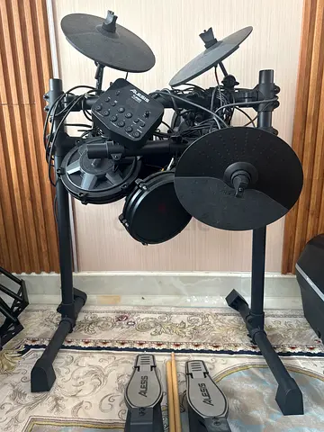 Compact electronic drum kit with cymbals and dual pedals - good condition