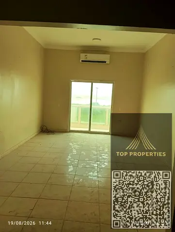 Two-bedroom apartment with a large living room, balcony, and a large kitchen with a balcony.