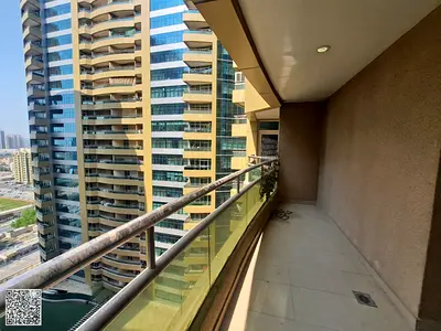 Studio apartment for sale in Horizon Tower, Al Rashidiya area, Ajman, with balcony, high floor.