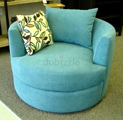 Round Swivel Accent Chair in Light Teal with Cushions