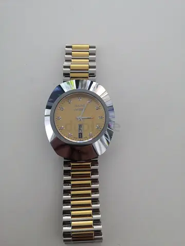 Two-tone men's wristwatch with diamond markers, day/date