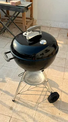 Portable charcoal kettle grill in good condition
