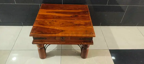 Heavy wooden coffee table with drawer