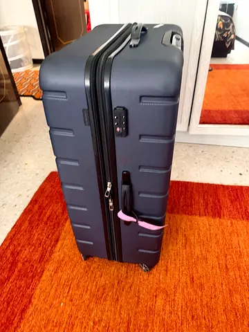 Large navy hard-shell roller luggage suitcase - good condition