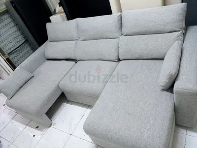 Light grey L-shaped fabric sofa with chaise - good condition