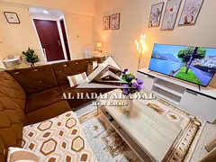 One bedroom and living room in Al Taawun Tower, good size, two bathrooms, rent 4000 AED including in