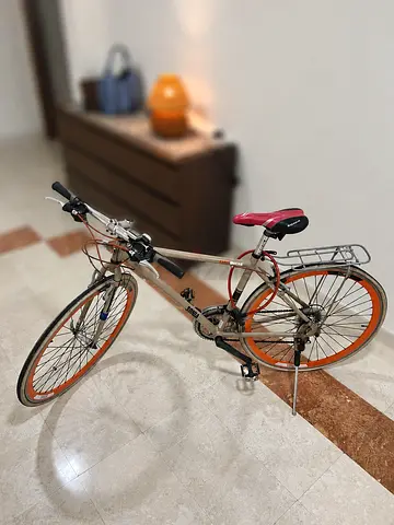 Sonia City Bike with Rear Rack and Orange Rims