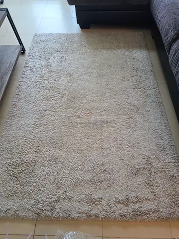 Light beige shaggy rug - good condition