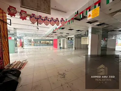 معرض 8000 قدم² _ طابق أرضي _ تكييف مركزي _ موقع مميز _ الراشدية 1 عجمان _ مناسب للهايبرماركت والجيم والبراندات _ 700 ألف سنويًا