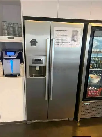 Bosch side by side fridge and freezer new model slightly used with ice maker water dispenser