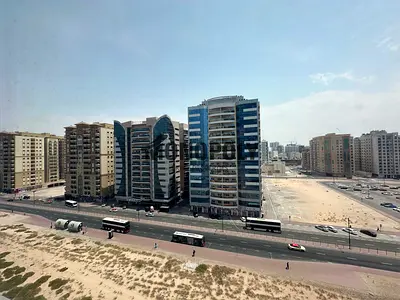 Spacious Apartment with Open View Next to Sahara Mall | 30 Days Free | Free Gym, Pool & Maintenance